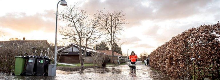 Kommuner tøver med smart asfalt på trods af flere skybrud